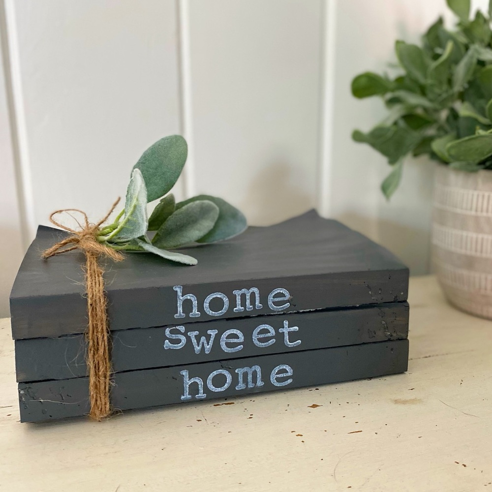 Farmhouse hand-stamped bookstack home decor “Home Sweet Home” with greenery